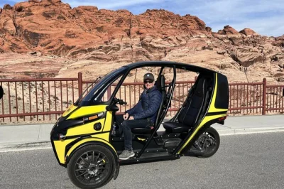 Escape las vegas for a private red rock canyon drive in your own electric vehicle, with scenic stops, flexible pace, and comedy show tickets included.