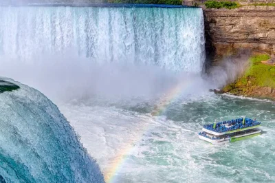 Feel the spray on the maid of the mist, step onto hurricane deck at cave of the winds, and see all three falls up close—express tour with pickup included.