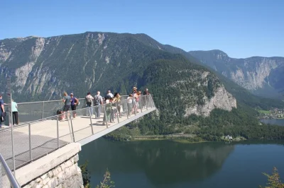 Feel the alpine air on a hallstatt day trip from vienna, with stops at ort castle, lakeside walks, and the skywalk or boat ride. includes pickup & live guide.