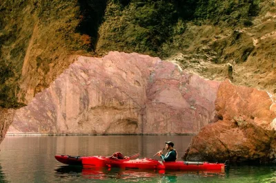 Paddle the colorado river to emerald cave with a local guide, enjoy a catered lunch on a canyon beach, and explore black canyon’s history—kayaks, gear, and support included.