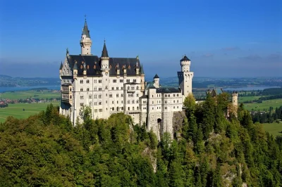 Feel the bavarian alps, tour neuschwanstein castle, stroll linderhof palace gardens, and relax on a comfortable coach with skip-the-line ticket options included.