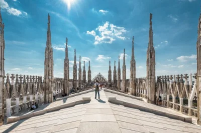 Feel the marble under your feet on milan’s duomo rooftop, skip the line with fast-track access, and wander inside the cathedral with a local guide—all in one booking.