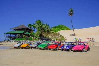 Feel the wind on a natal buggy tour across genipabu dunes, jacumã & pitangui lagoons, with hotel pickup and a local driver. includes lunch by the beach.