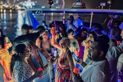 Feel the pulse of dubai at night on a 4-hour yacht party with bbq, open bar, and live dj. sail past marina & ain dubai with friends. includes drinks & crew.