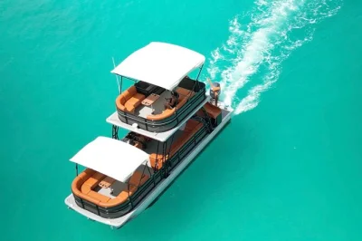 Step onto a double-decker boat in barbados for a laid-back cruise, bajan-style lunch, open bar, and snorkeling with sea turtles—includes chef-prepared meal and gear.