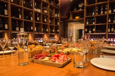 Let a parisian sommelier guide you through french wine regions, taste five wines and artisan cheeses in a cozy cellar. includes lunch and expert-led pairing.