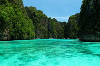 Arrive early at maya bay, snorkel clear waters near viking cave, and share a thai buffet lunch on a quiet beach. includes pickup and certified local guide.