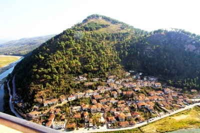 Follow ancient legends in berat, stroll durres’ seaside promenade, and relax by belsh lake on this day trip from tirana with guide and transport included.