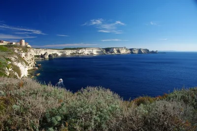 Start your corsica adventure by boat from porticcio to bonifacio and the lavezzi islands, with swimming stops and a local charcuterie and rosé tasting included.
