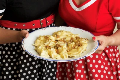 Step into a krakow kitchen for hands-on pierogi making, stroll the city’s oldest market for fresh ingredients, and share polish snacks & drinks with a local host.