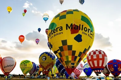 Float above majorca at sunrise on a small-group balloon ride, guided by an award-winning local pilot. includes hotel pickup and wifi at the launch site.