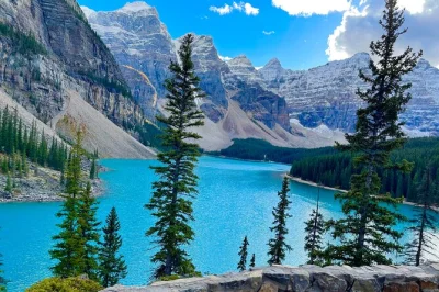 Start your banff adventure with a small group shuttle to lake louise and moraine lake. enjoy 1 hour at each lake, scenic photo stops, and local driver insights. easy pickup included.
