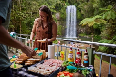 Feel the cool rainforest air, swim at lake eacham, and share laughs with local guides on this atherton tablelands day trip from cairns—flexible stops, lunch included.