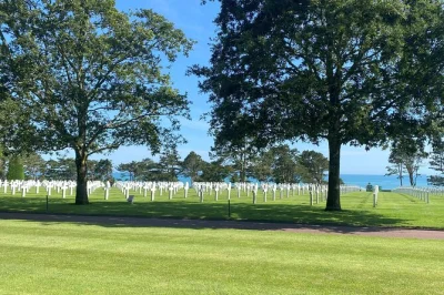 Feel the weight of history at omaha beach, walk the american cemetery, and stand atop pointe du hoc cliffs on this afternoon d-day tour from bayeux with local guide pickup.