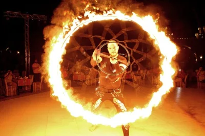 Feel the dubai desert come alive with dune bashing, camel rides, and a bbq dinner. includes hotel pickup, live shows, and local snacks for a full evening out.