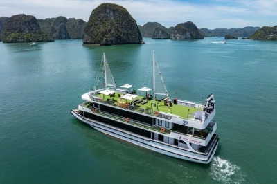 Start your halong bay day trip from hanoi with a 5-star cruise, local seafood lunch, and cave kayaking. includes hotel pickup, english-speaking guide, and sunset snacks.