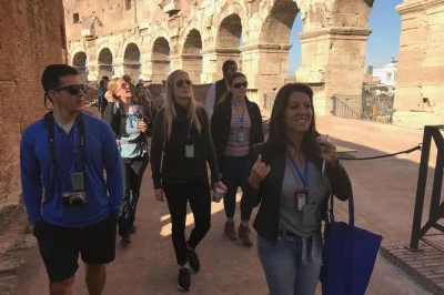 Step through the colosseum’s gladiator gate, stand on the arena floor, and wander the roman forum with a small group and expert guide—entry fees included.