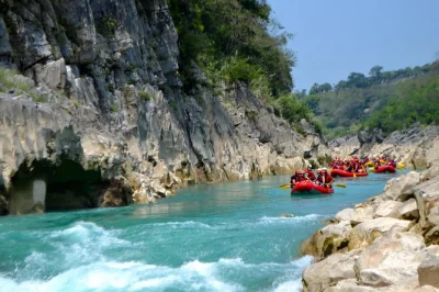 Feel the rush on tampaon river rafting near ciudad valles, paddle turquoise waters, laugh with guides, enjoy snacks & lunch, hotel pickup included.