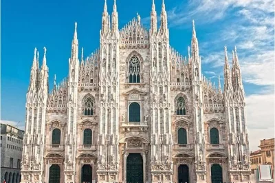 Feel the marble under your feet on milan’s duomo rooftop, skip the lines inside, and catch city views with a local guide. includes entry tickets and headphones.