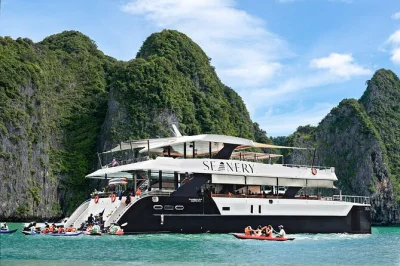 Start your phang nga bay journey with a luxury boat, kayak through hong island’s caves, see james bond island, and enjoy sunset dinner on deck. includes pickup.