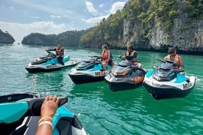 Glide by jet ski through langkawi’s islands, swim in dayang bunting lake, spot eagles overhead, and snorkel quiet coves. small groups, guide, gear included.
