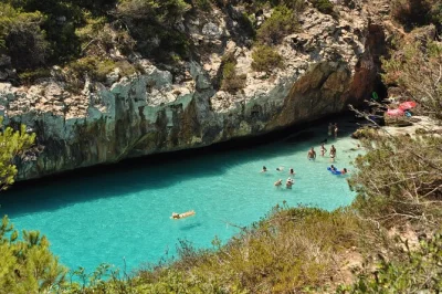 Swim, snorkel, and paddle at mallorca’s top coves like calo des moro. includes hotel pickup, local guide, all beach gear, and a relaxed van ride—no planning stress.