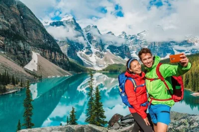 Feel the cool air at lake louise, walk the shores of moraine lake, and cross yoho’s natural bridge on a full-day canadian rockies tour with pickup included.