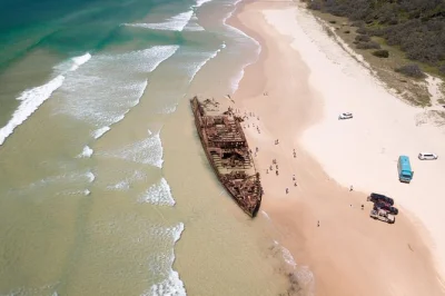 Feel the wild side of k'gari (fraser island) on a two-day tour with hotel pickup, 4wd coach, local guide, and overnight at k'gari beach resort—includes meals.