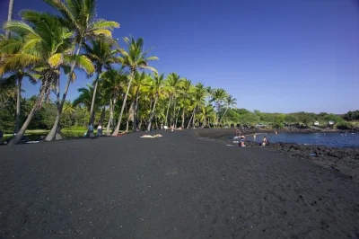Descubre la energía pura de la big island de hawái: camina por tubos de lava, prueba el café kona y observa tortugas marinas en playas de arena negra. incluye almuerzo y recogida en hotel.
