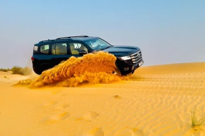Feel the thrill of dubai’s desert with dune bashing, sandboarding, camel rides and a bbq dinner. includes pickup, live shows and local guide for a real taste of adventure.