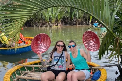 Step into hoi an’s water coconut forest by basket boat, try crab fishing, and share folk songs with locals. includes hotel pickup, tea, and entrance ticket.