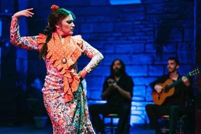 Feel the pulse of triana in seville with a live flamenco show at baraka, right by the guadalquivir. includes drink, local artists, wheelchair access, easy booking.