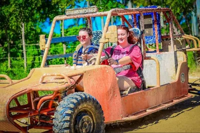 Feel the rush in punta cana with a wild family buggy ride, taste fresh chocolate at an organic farm, swim in a cave, and relax on macao beach. includes pickup.