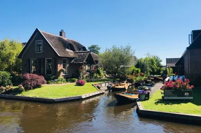 Feel the windmills at zaanse schans, taste dutch cheese, and cruise giethoorn’s canals—all in one day from amsterdam. includes hotel pickup and local guide.
