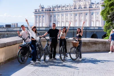 Feel madrid’s heart on a guided bike tour through plaza mayor, retiro park, and local markets. includes bike, helmet, water, and spanish tapas stop.
