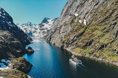 Feel the quiet of lofoten’s trollfjord on a silent hybrid-electric cruise from svolvær, with underwater drone views, local crew stories, and onboard food options.