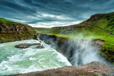 Feel the steam at geysir, taste fresh ice cream at a dairy farm, see gullfoss waterfall and kerid crater on this small group golden circle day trip from reykjavik with pickup.