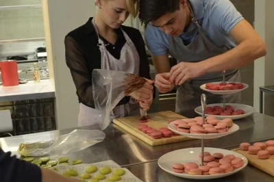Try your hand at french pastry in paris with a hands-on macaron cooking class, expert instructor, and a box of your own creations to take home. small group, drinks included.