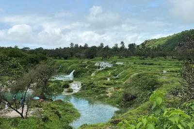 Feel the mist at wadi darbat’s waterfall, hike rare baobab forests, and stand above the clouds at dhofar’s highest point. includes bottled water and ac vehicle.
