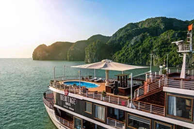 Wake up to limestone cliffs in lan ha bay, kayak quiet coves, try vietnamese cooking, and sleep in a private suite. includes meals, pickup & local guide.