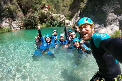 Feel the rush of canyoning in rio verde near nerja—slide, rappel, and swim through crystal pools with a local guide. includes gear, transport, and bottled water.