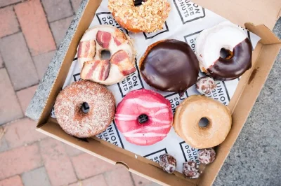 Bite into boston’s donut scene on a walking tour with stops at kane’s, cider donuts at the public market, and north end classics. includes all tastings.