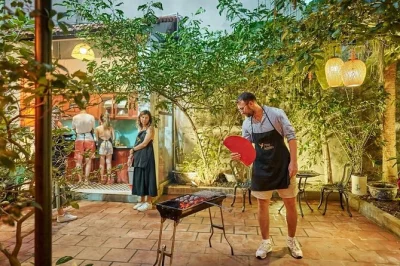 Step into a peaceful hanoi villa for a hands-on cooking class with local storytellers. choose your dish, sip egg coffee, and support community women—includes lunch.