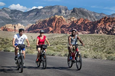 Feel the desert air on a red rock canyon ebike tour from las vegas, with hotel pickup, small group guide, and stops for petroglyphs, photos, and snacks.