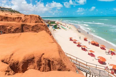 Wake up early in fortaleza for a day trip to morro branco, praia das fontes & canoa quebrada. includes hotel pickup, air-conditioned transport, and local guide.