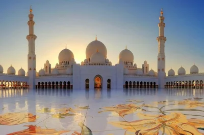 Feel the quiet beauty of abu dhabi’s sheikh zayed grand mosque on a guided half-day tour from dubai, including hotel pickup, abaya loan, and chilled water.