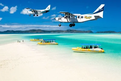 Feel the rush of a scenic flight over heart reef, snorkel coral gardens, and walk barefoot on whitehaven beach. includes lunch, all gear, and local guides.