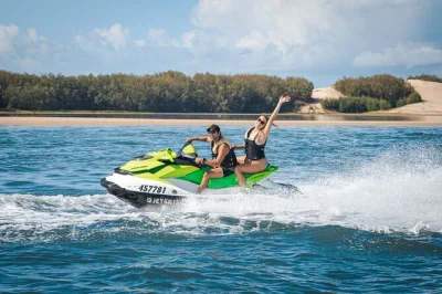 Feel the rush on a gold coast jet ski safari, winding through mangroves and tidal passages, with a local guide and an island bar stop. includes safety gear and photos.