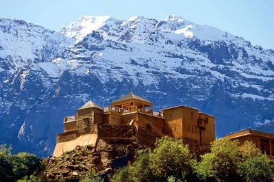 Step from marrakech into the atlas mountains for a day trip with gentle hikes, berber village visits, a home-cooked lunch, and hotel pickup included.