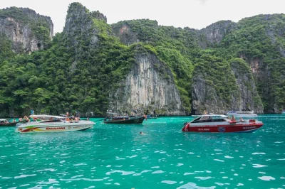 Feel the rush of a phi phi islands day trip from phuket with snorkeling, monkey beach, maya bay sights, and a private seaview lunch. includes hotel pickup.